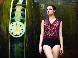 <p>Vest with hand crochet front, knitted rib back.</p>
