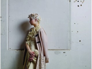 <p>9gg circular machine knitted boiled wool cut & sewn coat with lace pockets.</p>
